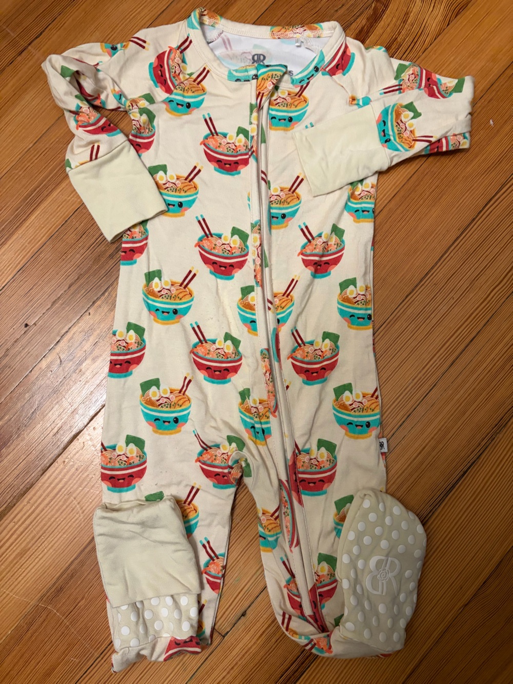 Cream Kids Footed One-Piece Pajama with Colorful Ramen Bowl Print